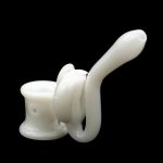 White glass bubbler shaped like a cat, side view on a black background.