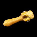 Yellow glass pipe with textured grip.