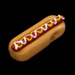 Glass pipe shaped like a hot dog with mustard and relish.