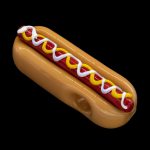 Glass pipe shaped like a hot dog with mustard and ketchup.