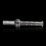 Clear glass oil burner pipe with vertical lines and a rounded mouthpiece, reflecting on a dark surface.