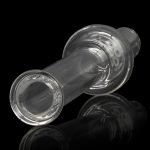 Clear glass water pipe with swirling iridescent patterns, reflecting on a dark surface.