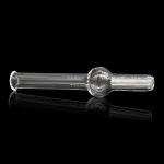 Clear glass oil burner pipe with a spherical bowl and textured mouthpiece, reflected on a black surface.