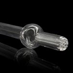 Clear glass oil rig with a spherical water chamber and diffused downstem, reflecting on a black surface.