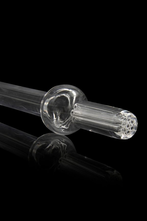 Clear glass oil rig with a spherical water chamber and diffused downstem, reflecting on a black surface.