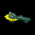 Green glass cannabis pipe shaped like a caterpillar with yellow and clear accents.