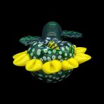 A vibrant green and yellow glass cannabis water pipe shaped like a turtle, isolated on a black background.
