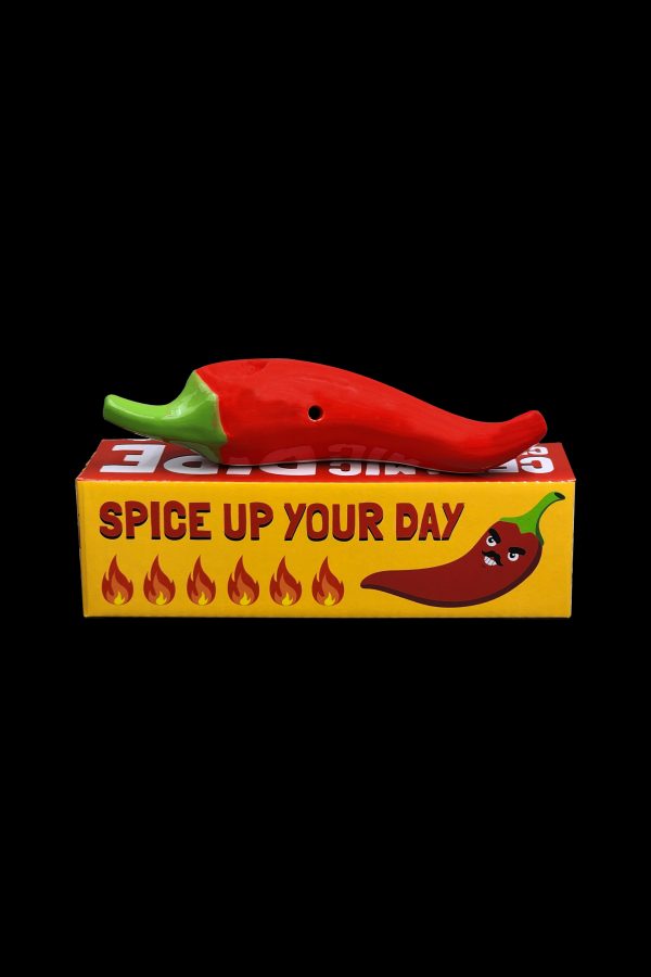 Red pepper-shaped cannabis storage box with “Spice Up Your Day” text and flame graphics.