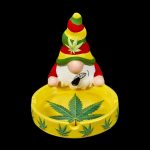 Ceramic garden gnome with a Rasta-colored hat and a cannabis leaf-decorated ashtray base.
