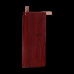 Wooden one-hitter pipe with engraved branding against a black background.