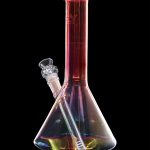 Iridescent glass water pipe (bong) against a black background.