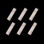 Six white cannabis ashtrays with the word "ASH" printed on a black background.