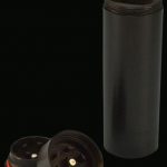 Top-down view of the open All In 1 Metal Dugout w/Poker & Grinder, showing the interior with a metallic grinder and poker tool.