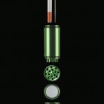 Front view of the All-In-One Dugout & Grinder with Storage, showcasing its cylindrical shape and layered compartments.