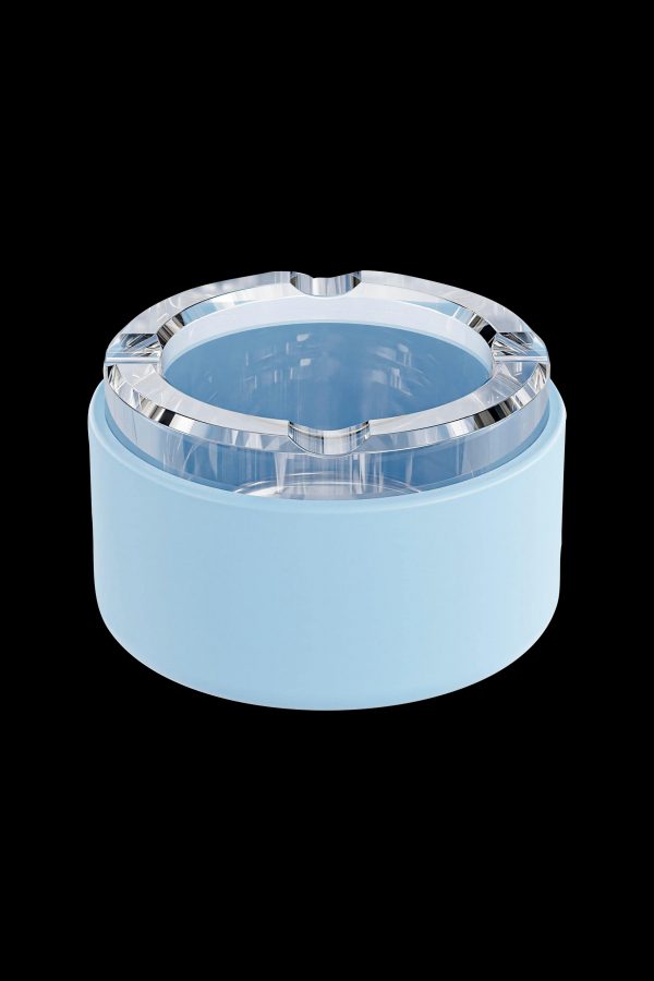 Light blue acrylic grinder for cannabis.