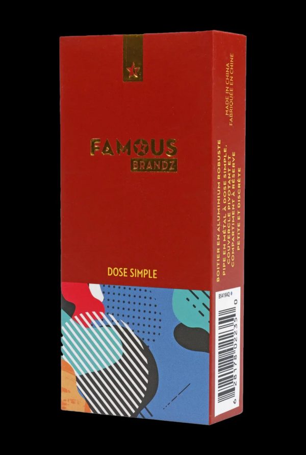 Red aluminum case for a cannabis smoking pipe, branded "Famous Brandz" with colorful geometric patterns.