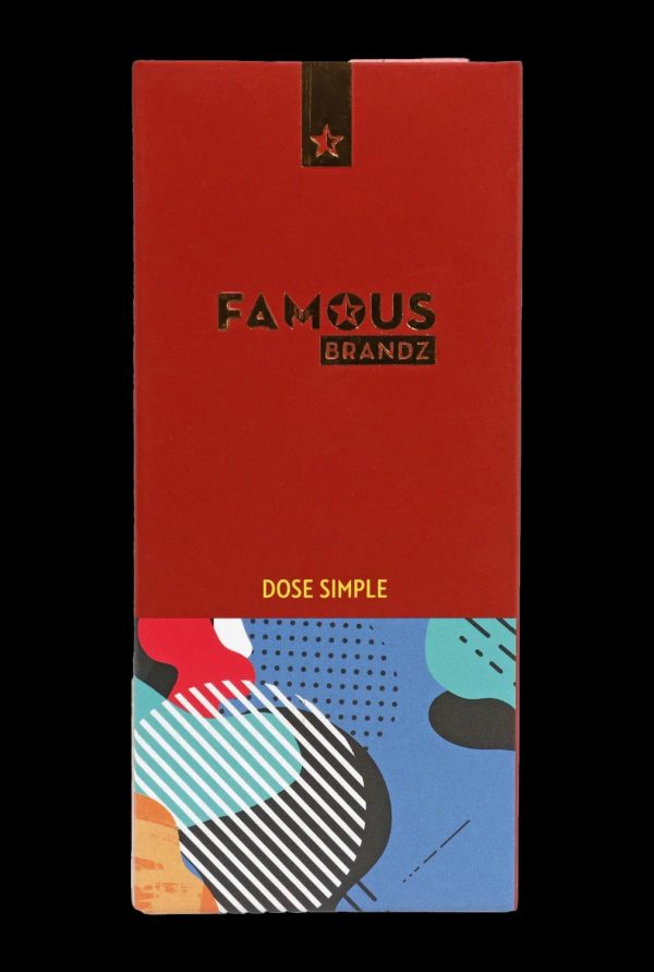 Red packaging for “Dose Simple” cannabis accessories by Famous Brandz, featuring abstract geometric designs.
