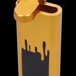 Gold butane lighter with dripping cannabis leaf silhouette.
