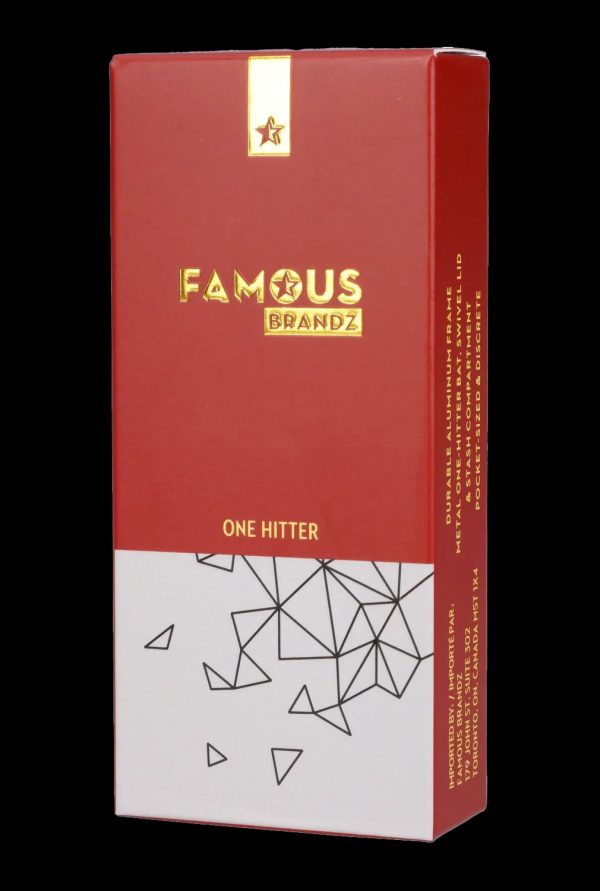 Red packaging for “Famous Brandz” One Hitter, a durable aluminum smoking device with a geometric design.