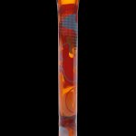 Hand-blown glass cannabis pipe with orange and red swirls.