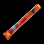 Red glass pipe with colorful floral and starburst patterns.