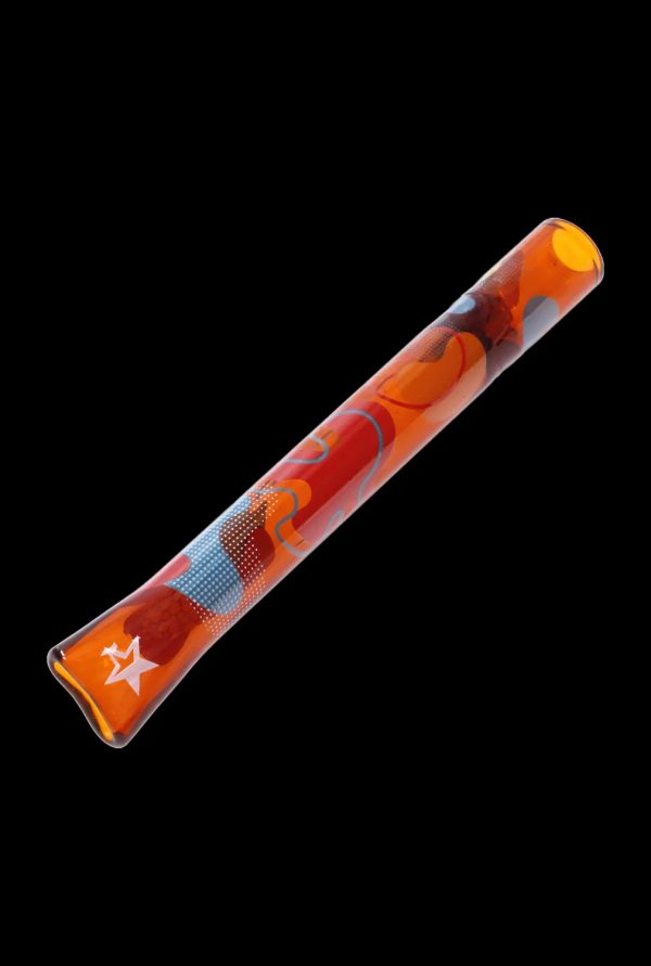 Red glass pipe with colorful floral and starburst patterns.
