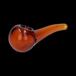 Amber glass pipe isolated on a black background.