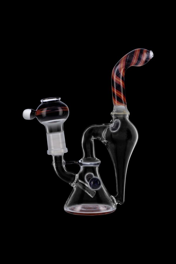 Clear glass water pipe (rig) with red and white striped accents, studio shot on black background.