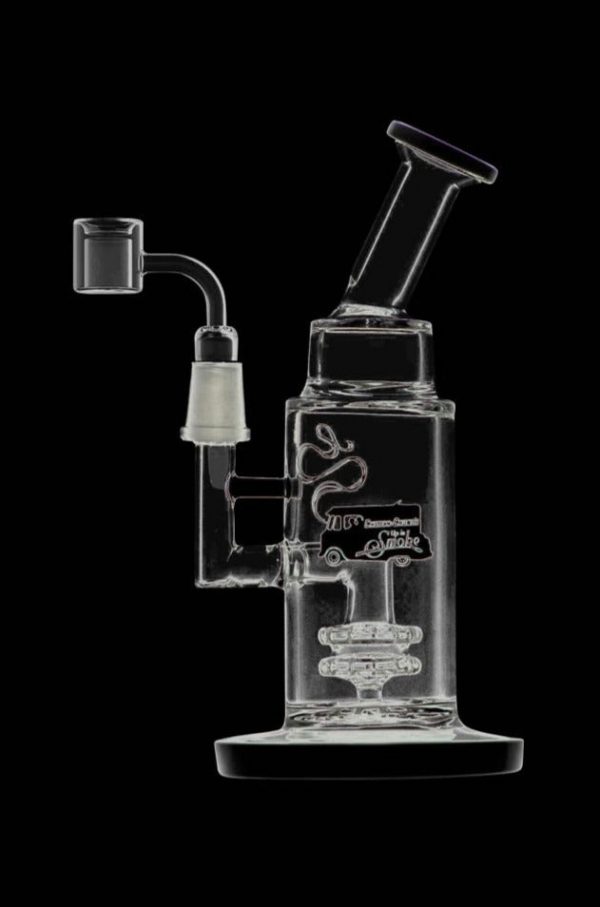 A studio shot of the Cheech & Chong Showerhead Perc Dab Rig - Anthony, displaying its clear glass construction and unique perc design.
