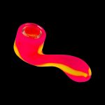 Neon pink glass pipe isolated on a black background.