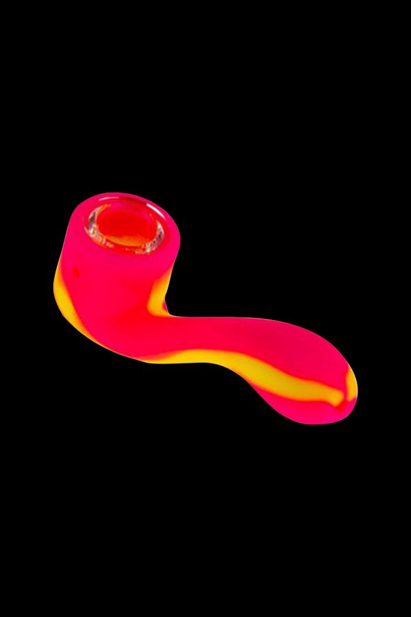 Neon pink glass pipe isolated on a black background.