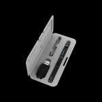 Cannabis vape pen kit open in a white case, displaying the pen, charger, and accessories.