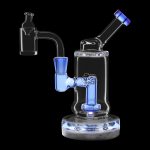 Blue glass dab rig with intricate design and clear base, isolated on a black background.