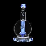 Blue glass dab rig with intricate design, illuminated against a black background.