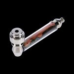 Glass pipe with visible cannabis inside, isolated on a black background.