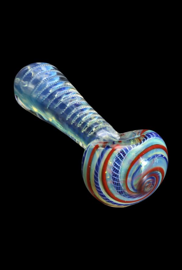 A detailed side view of the SC Engraved Fumed Spoon Pipe - 3 in., displaying its curved shape and iridescent finish against a dark background.