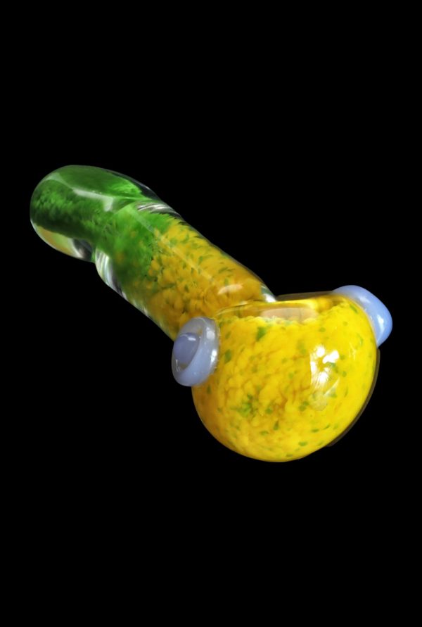 A side view of the SC Tri-Color Frit Flat Spoon Pipe, showcasing its vibrant, colorful frit pattern on a smooth, curved form.