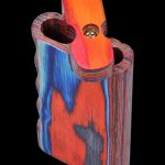 Front view of the SC Colourful Wood Grain Dugout - Large, displaying a wooden case with a visible opening and grain texture.