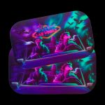 Neon “Welcome to Fabulous Las Vegas” sign rendered on a patterned cannabis rolling tray.