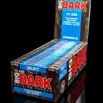 A display box of “Select Bark” 1 ¼ size slow-burning rice rolling papers and tips, with branding in blue, red, and white.