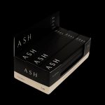 Stacked black boxes labeled "ASH" and "Classic," likely containing cannabis pre-rolls or accessories.