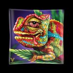 A vibrant, colorful illustration of a chameleon with a cannabis bud partially hidden amongst green leaves, displayed on a glass tray with a "Syndicate" logo in the corner.