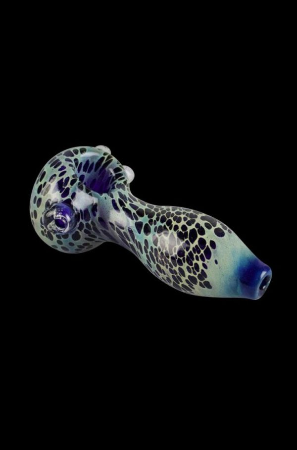 A side view of the Color Spotted Glass Hand Pipe, showcasing its speckled pattern and curved form against a dark background.