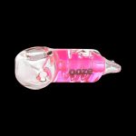 Pink glass smoking pipe with "ooze" branding.