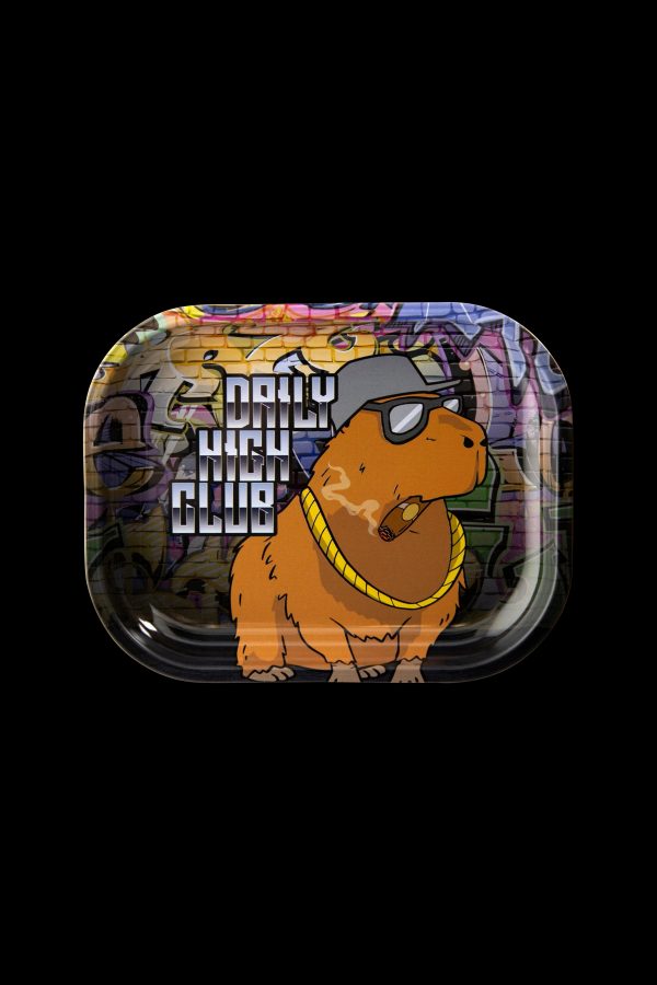 A colorful, rectangular rolling tray featuring a cartoon capybara wearing sunglasses and a gold chain against a graffiti-style brick wall backdrop with the text "DAILY HIGH CLUB".