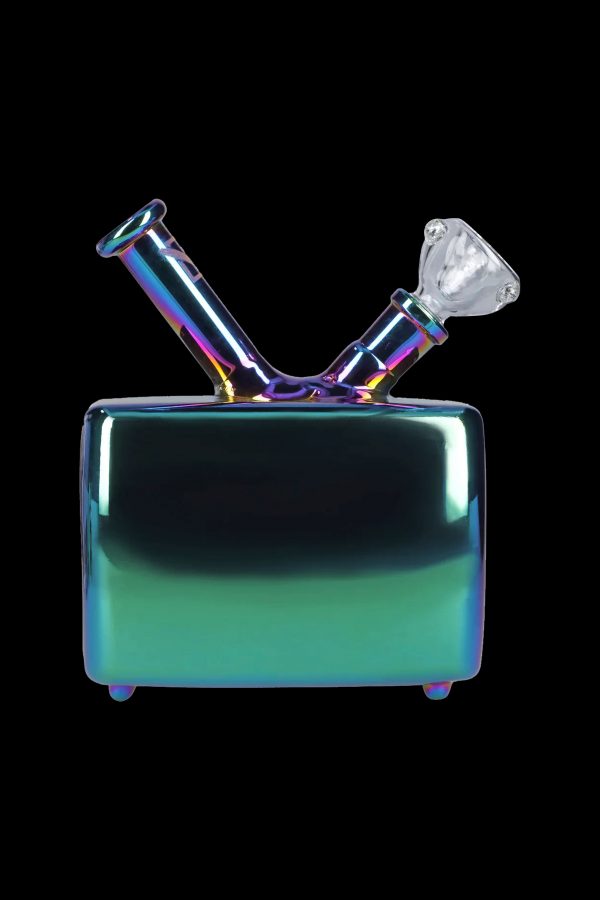 Iridescent glass water pipe resembling a handbag, isolated on black.