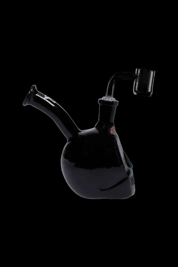 Black glass water pipe with floral design and accompanying glass bowl.