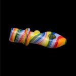 Colorful glass pipe against a black background.