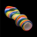 Colorful glass bubbler for smoking, isolated on a black background.