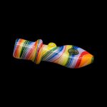 Colorful glass pipe against a black background.